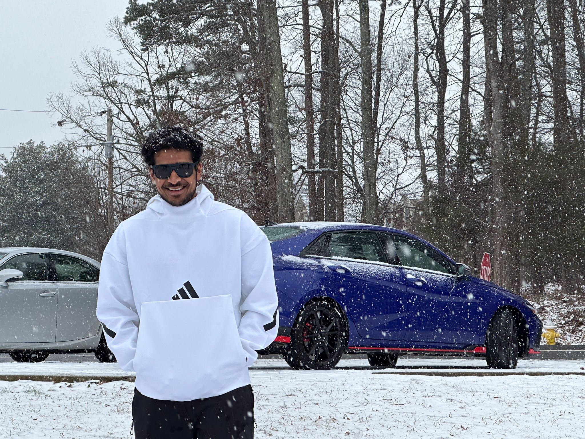 Anuraag with automotive backdrop